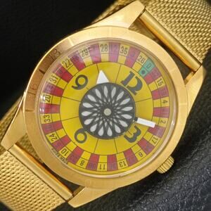 Vintage 1980 Roulette Manual Mens Gold Watch W/Gold Strap & Red accents